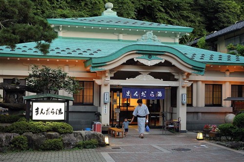 Entrance of Mandarayu, one of the historic public baths in Dogo Onsen, welcoming guests with a traditional atmosphere.