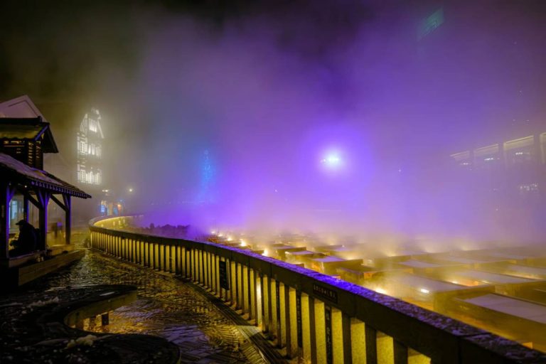 Kusatsu Onsen Yubatake at Night – Illuminated Steam and Atmosphere